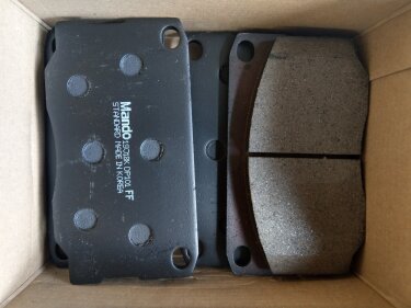 Колодки тормозные передние дисковые HYUNDAI HD65/72 (Mando)