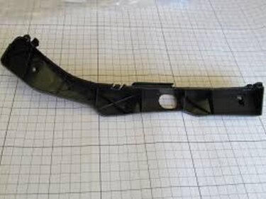 Кронштейн бампера переднего L Geely MK (оригинал)